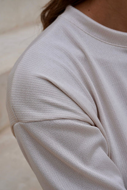 Buzo Pale Crema